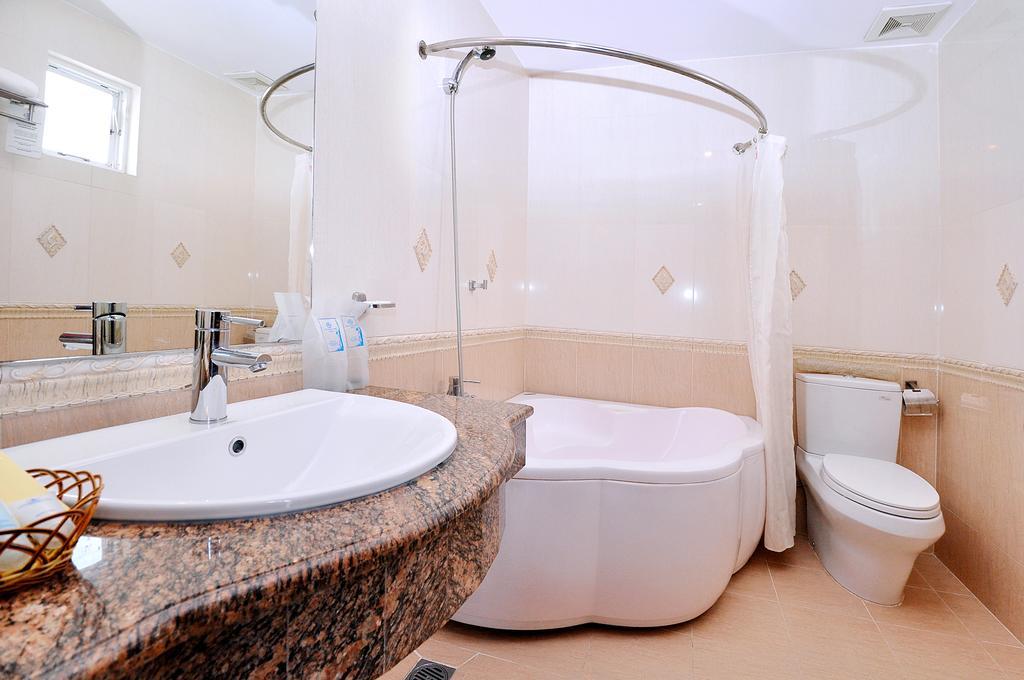 Tan Hoang Long Hotel Хошимін Номер фото