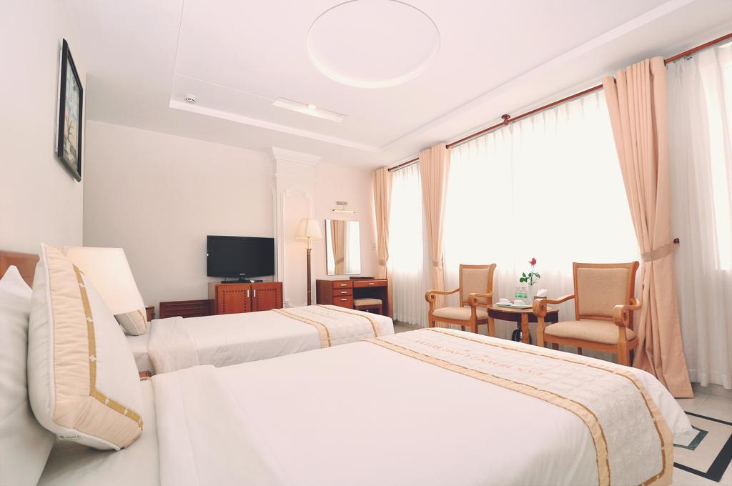 Tan Hoang Long Hotel Хошимін Номер фото